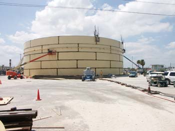 Vecellio Group VP of Safety John West and Vecenergy Safety Manager Glen Moll review diesel tank construction at South Florida Materials Corp. 