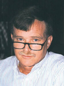 In Memoriam: John DeFrehn, V.P. — Finance